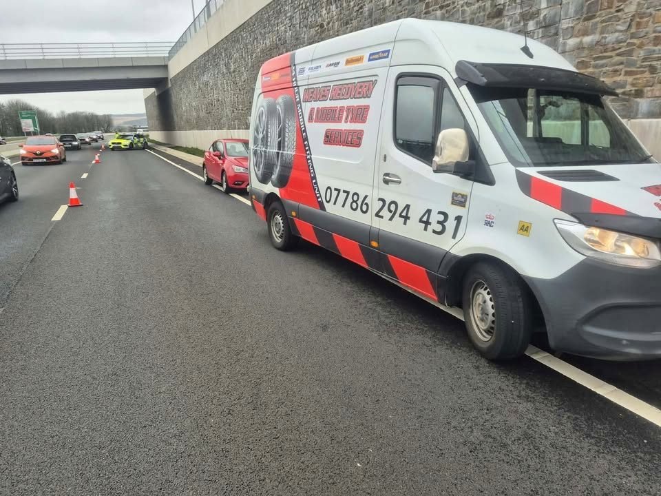 Weaves branded recovery van attending a breakdown on a South Wales motorway